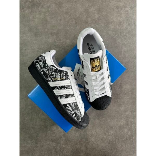 Adidas Superstar “ Black & Label Collage “